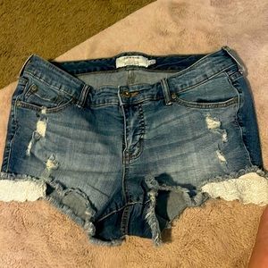 Womens Torrid distressed jean shorts size 12
